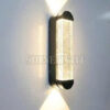 Đèn LED tường 672 gắn tường trắng, hắt hai luồng sáng vàng lên trên và xuống dưới