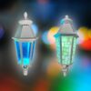 Đầu đèn led cảnh quan SL-CQ-New bật sáng xanh trên nền đèn màu nhòe